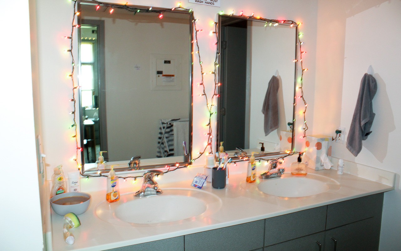 Tuner dorm room bathroom decorated with Christmas lights 